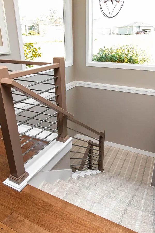 Plaid stairs in office building with sunny windows